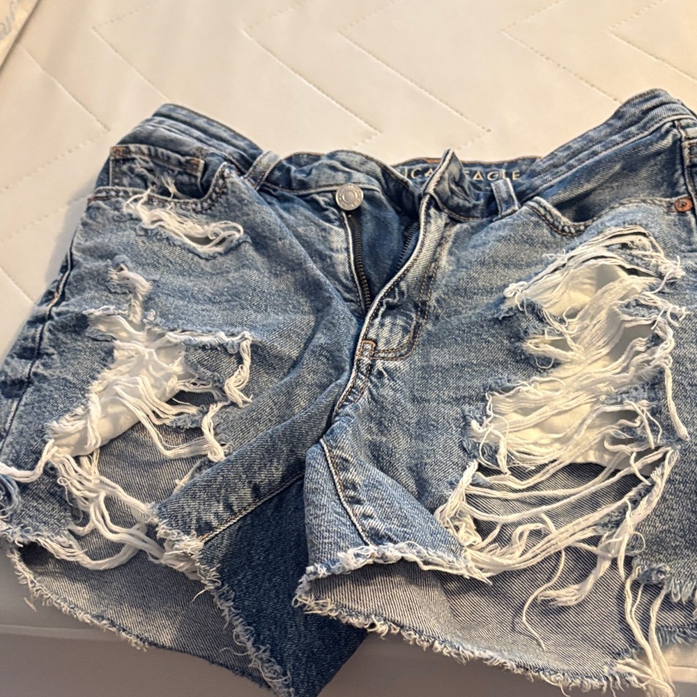 American Eagle Outfitters Ripped Light Blue Jean Shorts